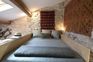 Postel nebo postele na pokoji v ubytování La Borie Oubliée + 37 fotografií