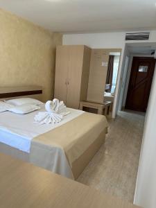 Postel nebo postele na pokoji v ubytování Hotel Selena Boutique