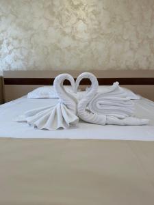 Postel nebo postele na pokoji v ubytování Hotel Selena Boutique