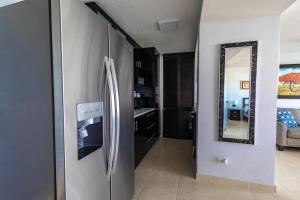 Kuhinja oz. manjša kuhinja v nastanitvi Lovely 2-2 Condo with the best view of Puerto Rico
