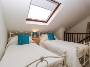 Postel nebo postele na pokoji v ubytování The Cottage at Rocklands Farm