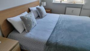 Postel nebo postele na pokoji v ubytování Comfortable Apartment Gerbera Tallinn