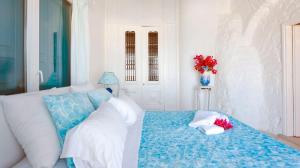 Letto o letti in una camera di Villa Boufla