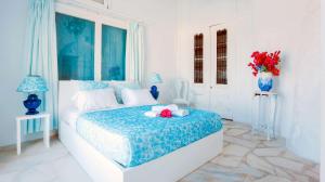 Letto o letti in una camera di Villa Boufla