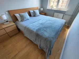 Postel nebo postele na pokoji v ubytování Comfortable Apartment Gerbera Tallinn