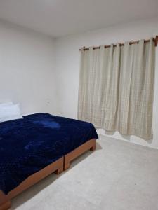Postel nebo postele na pokoji v ubytování Hospedaje familiar Los Arcos + 19 fotografií