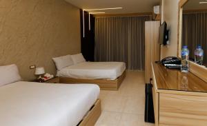 Katil atau katil-katil dalam bilik di Giza Pyramids View Inn