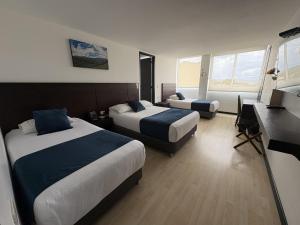 Postel nebo postele na pokoji v ubytování Hotel H53