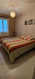 Postel nebo postele na pokoji v ubytování Maison de vacances en Périgord + 18 fotografií