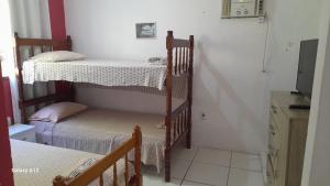 Postel nebo postele na pokoji v ubytování Hospedaria Casa de Maria