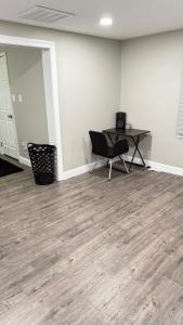 an empty office with a desk and a chair in a room at Rooms available in a single Family home shared with Host in Willingboro