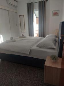 Postel nebo postele na pokoji v ubytování Villa Vilma