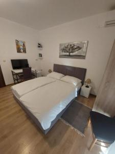 Postel nebo postele na pokoji v ubytování Villa Vilma