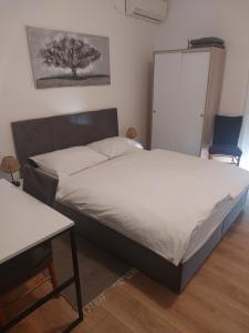 Postel nebo postele na pokoji v ubytování Villa Vilma