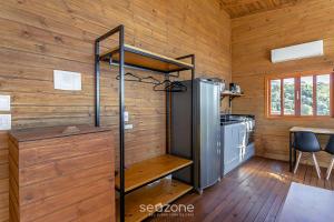 Η κουζίνα ή μικρή κουζίνα στο Charmosa cabana na serra c/jacuzzi VST014 +11 φωτογραφίες