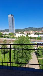 a view from the balcony of a building with a train at I SOGNI di LEO 2 in Turin