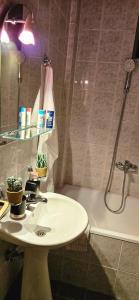 a bathroom with a sink and a shower at Jana's Apartment,100 meters to the lake,Free Parking in Ohrid +26 photos