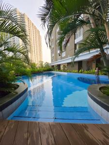 Bazén v ubytování apartemen2BR cozy,cheapset pluit sea view nebo v jeho okolí