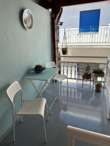 Balkón nebo terasa v ubytování Aegean Blu Port House Pythagoreio
