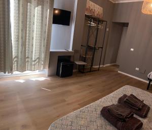 TV a/nebo společenská místnost v ubytování Riva Reno 4 Rooms