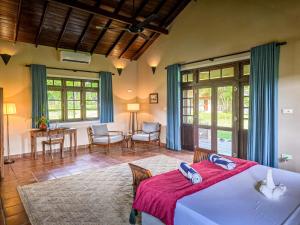 Postel nebo postele na pokoji v ubytování Gal Oya Lake Club + 122 fotografií