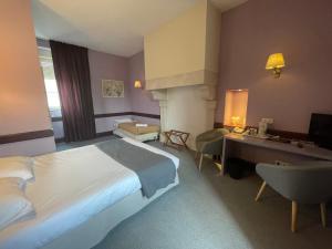 Postel nebo postele na pokoji v ubytování Hotel l'Orée Des Vignes + 37 fotografií