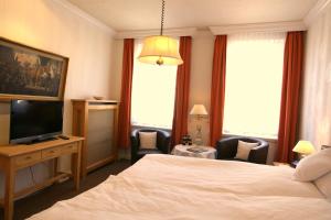 Katil atau katil-katil dalam bilik di Hotel Beckröge