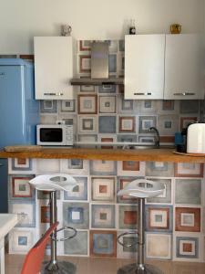 Η κουζίνα ή μικρή κουζίνα στο Suite ad maiora +27 φωτογραφίες