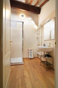 a bathroom with a sink and a shower at My Loft in Ferrara