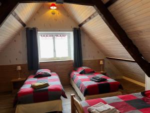 Postel nebo postele na pokoji v ubytování Moulin de la Fosse Soucy "Les Merisiers"