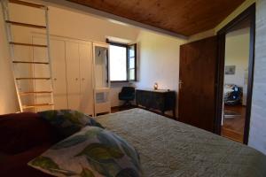 A bed or beds in a room at Duca House