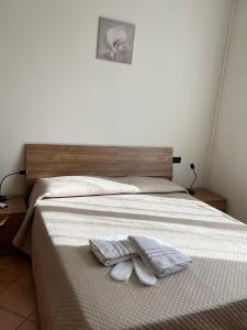 Letto o letti in una camera di Lucky House