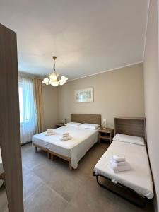 Katil atau katil-katil dalam bilik di Appartamento con giardino a 10 minuti dal centro