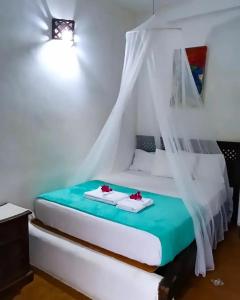 Katil atau katil-katil dalam bilik di Casa Tierra viva-Choroni +5 gambar