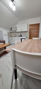 A kitchen or kitchenette at Apartments Stari Jasen Uvac