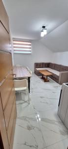 A seating area at Apartments Stari Jasen Uvac