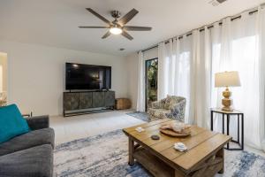 a living room with a couch and a table at Pet Friendly, Patio, Close to Beach, QG515 in Hilton Head Island