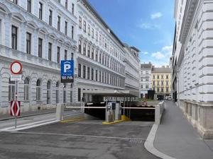 a parking lot in the middle of a city with buildings at Downtown Bliss Modern Retreat with FREE parking and FAST Internet 600 MBits in Vienna