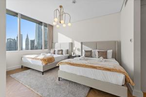 Luxury Apt DIFC, XL Layout, Pool, Gym, Skyline Viewにあるベッド