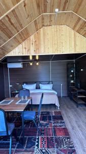 Ένα ή περισσότερα κρεβάτια σε δωμάτιο στο Tau Dream Hotel