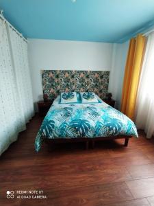 เตียงในห้องที่ Ti'Commerson