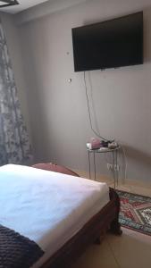 TV a/nebo společenská místnost v ubytování Elegant apartment in Rabat