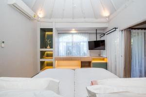Postel nebo postele na pokoji v ubytování Davinia Hua Hin Resort