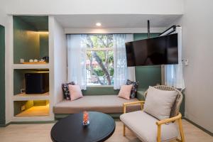 TV a/nebo společenská místnost v ubytování Davinia Hua Hin Resort