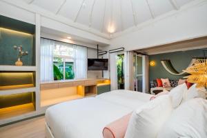 Postel nebo postele na pokoji v ubytování Davinia Hua Hin Resort
