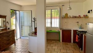 Kuchyňa alebo kuchynka v ubytovaní Casa Mediterraneo