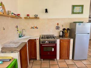 Kuchyňa alebo kuchynka v ubytovaní Casa Mediterraneo