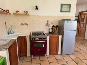 Kuchyňa alebo kuchynka v ubytovaní Casa Mediterraneo