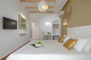 Letto o letti in una camera di Adriani Hotel