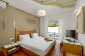 Letto o letti in una camera di Adriani Hotel